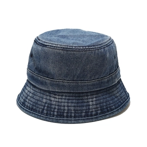 Retro washed denim bucket hat in deep blue cotton fabric with minimalist foldable design