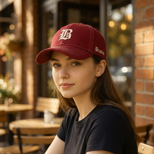 Deep red cotton baseball cap with 3D letter B embroidery and breathable eyelets