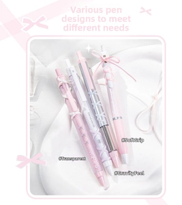 Detail of pink and white retractable gel pens with ribbon weaving and soft rubber grip