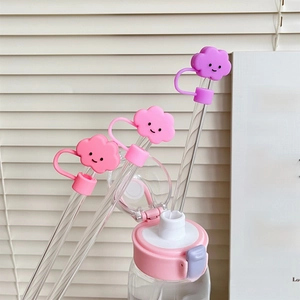 Detail shot of cute pink cloud straw covers with smile faces for 10mm drinking straws