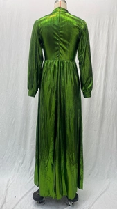 Detail of avocado green metallic pleated maxi dress with elegant floor-length hemline
