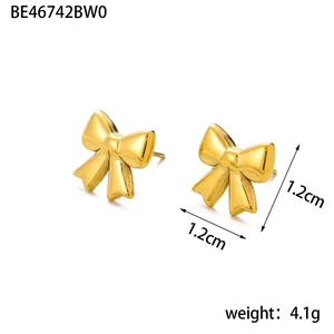 Macro view of 18K gold-plated bow stud earrings showing dimensions of 1.2cm and weight
