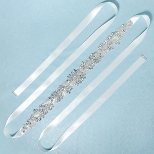 Luxurious bridal sash with silver rhinestones and pearls on white satin ribbon tie