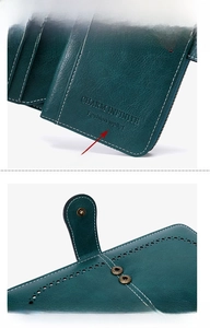 Detail view of dark green textured leather wallet with dual snap closure and secure zipper