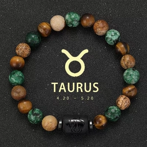 Detailed view of Taurus zodiac natural tiger eye and agate beaded stretch bracelet