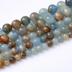 Polished natural blue calcite round beads for jewelry making in multiple sizes