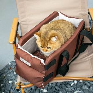 Portable dog car seat and pet travel carrier in brown canvas with soft lining for small dogs