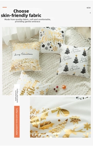 Detail of gold foil Christmas pillow cases featuring snowflakes and reindeer patterns