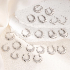 Variety set of minimalist silver stainless steel earrings in geometric and textured designs