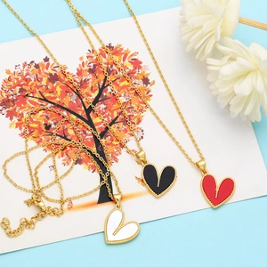 Three-piece heart necklace set with colorful enamel pendants in red black and white