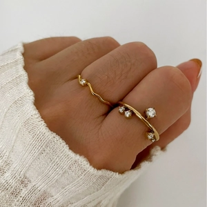 Elegant 18K gold plated titanium steel rings set with zircons for a minimalist style