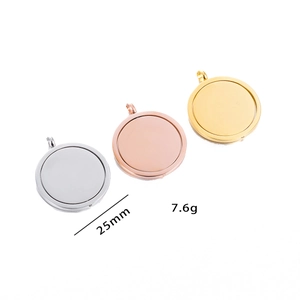 Detailed view of 25mm spinning disc pendants in silver, gold, and rose gold finishes