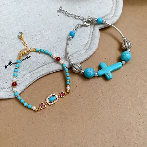 Bohemian turquoise bead bracelets with cross pendant and vintage gold and silver charms