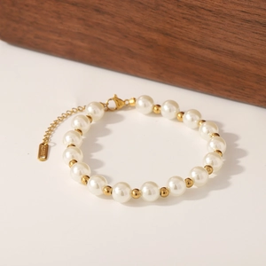 Baroque style 18k gold plated stainless steel bracelet with artificial pearls and heart charm