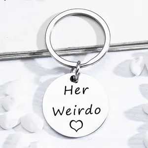 Polished stainless steel round keychain with Her Weirdo engraving and heart detail