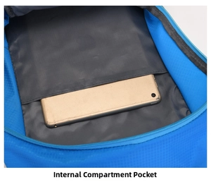 Detail of the blue nylon backpack interior showing a padded laptop compartment for tablets