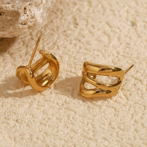 Close-up of gold-plated stainless steel earrings with irregular multilayered curved lines