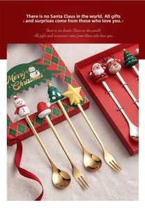 Macro detail of Christmas theme stainless steel spoon and fork set in festive gift box