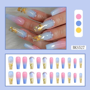 Detail view of 24pcs blue and pink gradient press-on nails with gold foil and gems