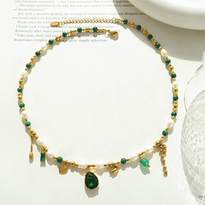 Baroque turquoise freshwater pearl necklace with 18k gold pendants and emerald drop charm