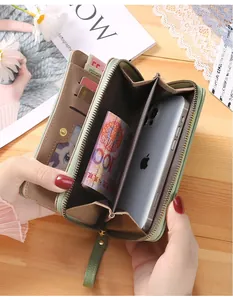 Detail of multi-slot long leather wallet with smartphone pocket and zipper compartment