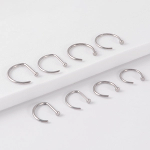 Set of 8 silver G23 titanium U-shaped non-piercing nose rings with flat head design
