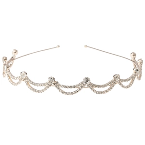 Silver wavy bridal headband featuring sparkling rhinestones and elegant pearls decoration