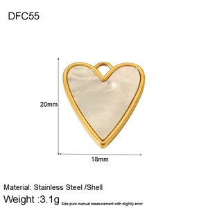 Macro detail of a 20x18mm gold stainless steel heart pendant with white shell inlay