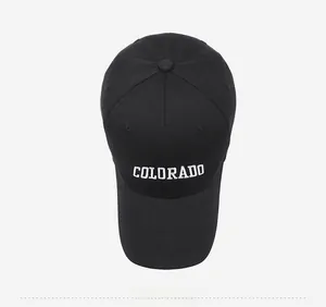 Top view of black cotton baseball cap with white COLORADO embroidery detail