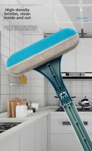 Double-sided mesh window cleaning brush with soft villi head for efficient household cleaning.