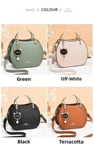 Round crossbody bags in four colors with cat pendants and golden handles detail