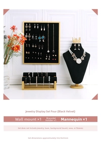 Black velvet jewelry display set with gold trim including wall board and necklace bust stand