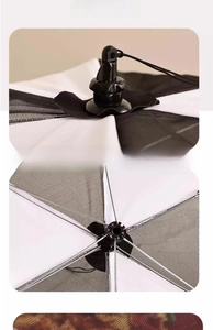 Detail of a foldable food cover with a sturdy steel frame and top pulling rope mechanism