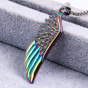 Macro shot of titanium steel feather wing pendant with rainbow metallic gradient finish