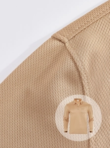 Macro detail of breathable knitted fabric on a men's khaki long sleeve polo shirt