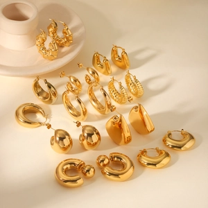 Detailed arrangement of 18K gold plated stainless steel hoop earrings and geometric studs