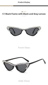 Macro shot of cat eye sunglasses with rhinestones and dark grey lenses on black frames