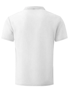 Detailed back view of white men's short sleeve polo shirt featuring premium waffle knit texture