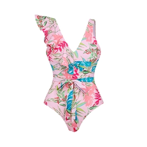 Detail of ruffle shoulder and waist tie on floral print one-piece swimsuit