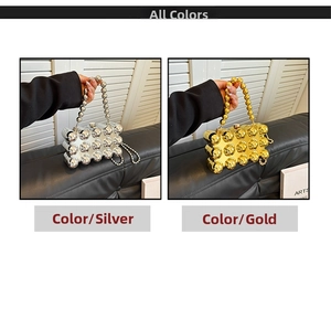Detailed view of silver and gold beaded acrylic box bags with metallic carry handles