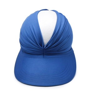 Detailed close-up of dark blue sun visor with pleated fabric texture and wide brim