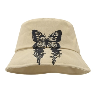 Beige cotton bucket hat with black butterfly print and stylish ripple reflection design