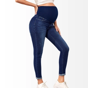 Side view of dark blue maternity jeans featuring a high elastic support belly band