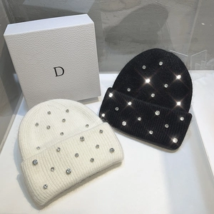 Luxe rabbit fur beanie with rhinestones in black and white knit for winter warmth