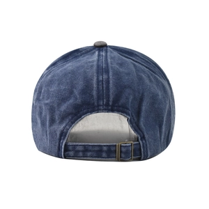 Close-up of vintage washed blue cotton baseball cap with adjustable bronze metal buckle