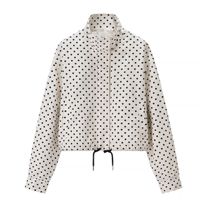 Polka dot cropped jacket with stand collar and adjustable drawstring waist in white and black