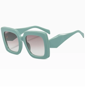 Detail view of mint green chunky square sunglasses with gradient purple lenses