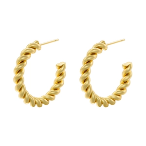Macro detail of gold-plated twisted C-shaped earrings with spiral textured finish