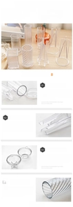 Detailed view of clear PC geometric sphere and cylinder candle molds for DIY crafting