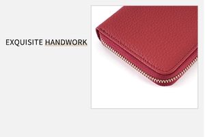 Close-up of red lychee grain leather wallet showing stitching and metal zipper detail